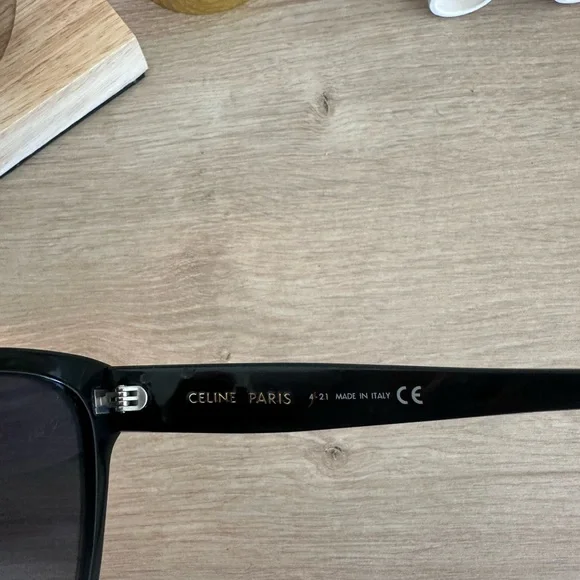 Black Sunglasses with Gold Logo Accents - Picture 4 of 5